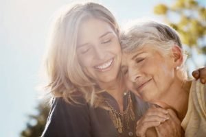 Shot of a happy senior woman spending quality time with her daughter outdoors